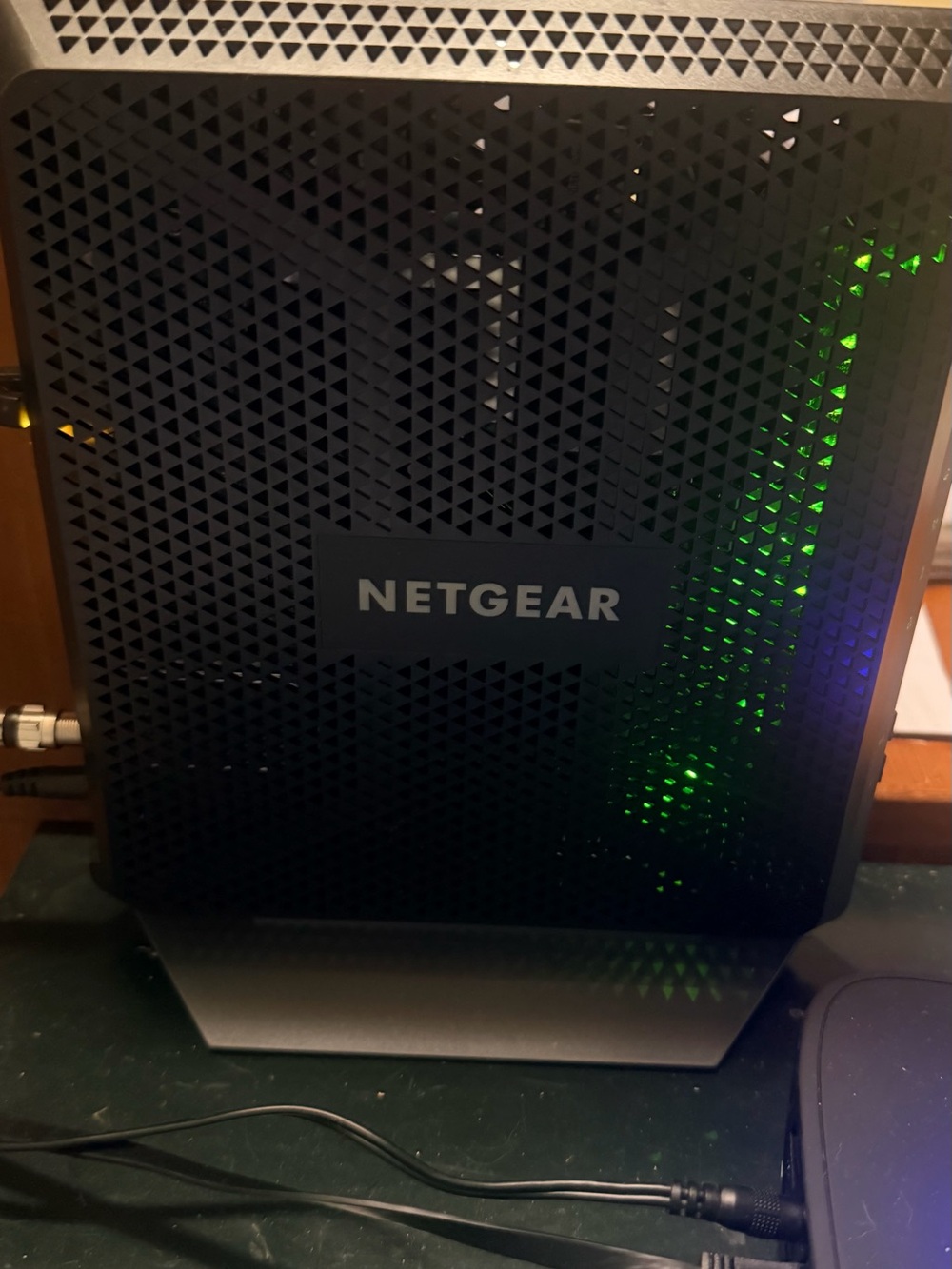NETGEAR Black Router with Green LED Indicator